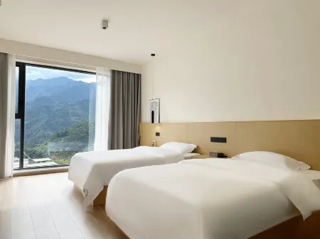 Guanshan Yishu (Wolong Nature Reserve Giant Panda Sanctuary Shenshuping Base) Отели рядом с достопримечательностью «Wolong China Giant Panda Garden Shenshuping Base of CCRCGP»