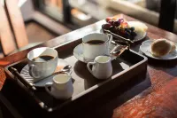 Yulong Qiyunli Designer Homestay - petit déjeuner