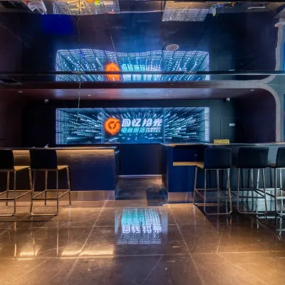 回憶拾光電競飯店（紅谷灘萬達廣場綠地雙子塔店） 南昌雙子塔303觀光廳附近的飯店