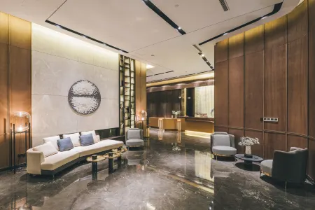 Shanghai Xujiahui Stadium Treasure Hotel Отели рядом с достопримечательностью «Longhua Temple»