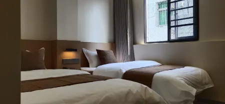 Baoting Chuanhong Smart Hotel Отели рядом с достопримечательностью «Qixian Square»