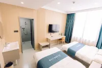 UP Huayi Hotel (Jixi Shi Railway Station Wanda Plaza)