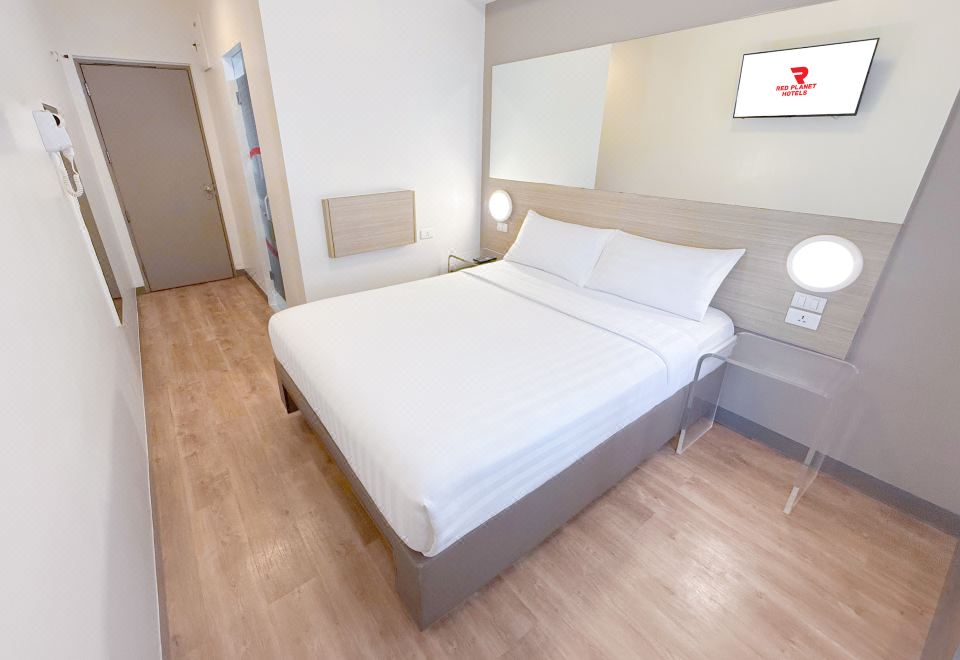 [레드 플래닛 아모르솔로의 깨끗한 객실 이미지]