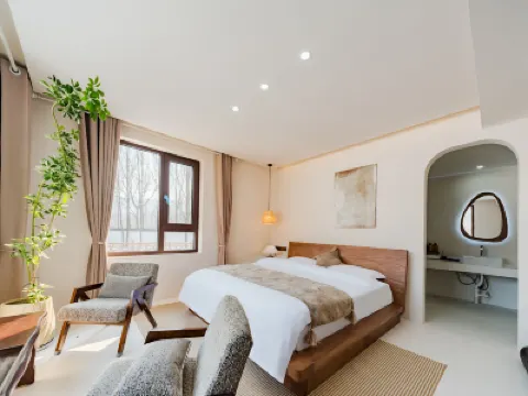 Floral Hotel·YouFeng Coffee Hotel Hotels near Jiuru Mountain Waterfall Scenic Area