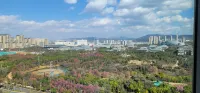 Huarong Designer Homestay (Kunming South Railway Station Colorful Yunnan Diyicheng Branch) - Bergblick
