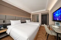 Jiulong Yipin Hotel (Xifeng High-Speed Railway Station Shizi Street Plaza) - موقف سيارات