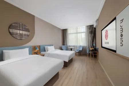 Home Inns & Suites·neo (Qian Gu Qing Branch of Xi'an International Convention and Exhibition Center) Отели рядом с достопримечательностью «Chang'an Tower»