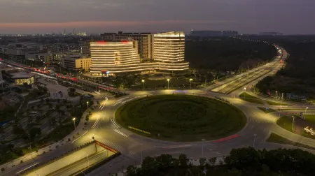 Maoming Ramada Hotel Отели в г. Маомин