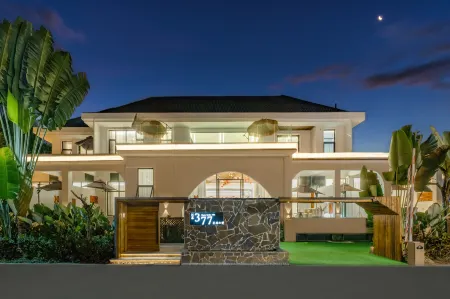 Jiangmu 377 Garden Private Villa Отели рядом с достопримечательностью «Xishuangbanna Folk Custom Garden»