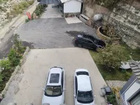 Jianqi Yang Family Courtyard Homestay - parcheggio