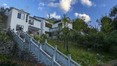 九華山喜見民宿（化城寺店） 九華山百歲宮纜車附近的飯店