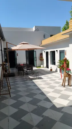 Huocheng Yunshang Huakai Homestay Отели в г. Хочен