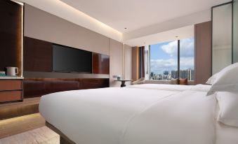 Jinnan International Hotel (HighSpeedRailCityWestStationProvincialPublicSecurity Department Store)