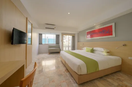 ห้องดีลักซ์ เตียงใหญ่ 1 เตียง