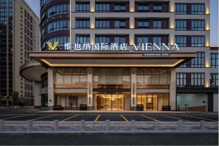 Vienna International Hotel (Cannei Government Wanda Plaza Store）) Отели в г. Анси