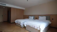 Xinlong Business Hotel (Huolinguole Hongyu Shopping Plaza Branch) Hotel di Holingol