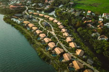 Namia River Retreat - Wellness Inclusive Resort Отели рядом с достопримечательностью «Museum of Folklore in Hoi An»