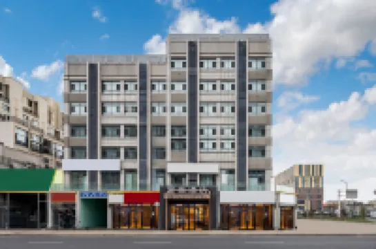 Echarm Hotel (Karamay Petroleum Building No. 1 Well)) Отели в г. Карамай