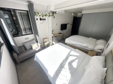 Moye Homestay (Wanda Plaza) Отели рядом с достопримечательностью «Ningde Normal University (South to Ningde Customs Anti-smuggling Bureau)»