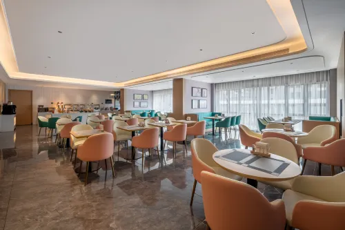 كانتري إن آند سويتس باي راديسون تناول الطعام Photos