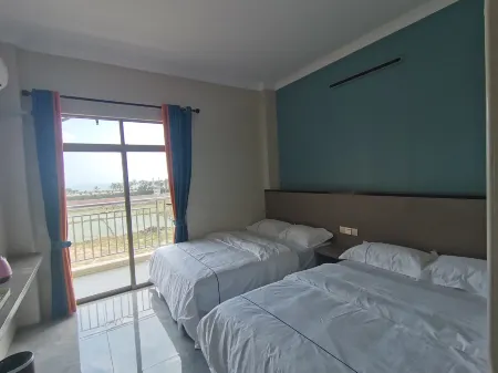 Taishan Xincheng Homestay Отели рядом с достопримечательностью «Langqin Bay»