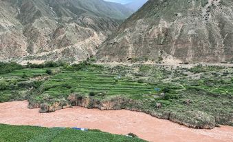 Mangkang Rumei Yijiang Kaiyue Hotel