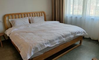 Lijia Xiaoyuan Homestay (Zhelinzhen Branch)