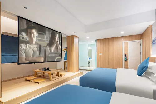 โรงแรมมูซีซี (สาขาโรงพยาบาลประชาชนแห่งแรก จิงโจว เหรินซินฮุ่ย) - ที่มีที่จอดรถ