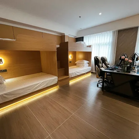 Meigao E-Sports Hotel Отели в г. Данту