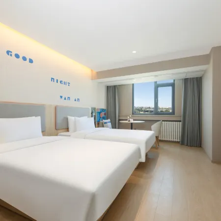 Xining Huasu Hotel (Ximen Wangfujing Central Plaza) Отели в г. Синьинг