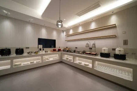 Taizhou Linhai Aifei Hotel (Linhai Railway Station Branch) Отели в г. Linhai