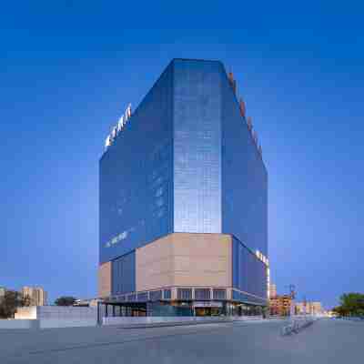 魔方大酒店(哈密火車站店) Hotel Exterior