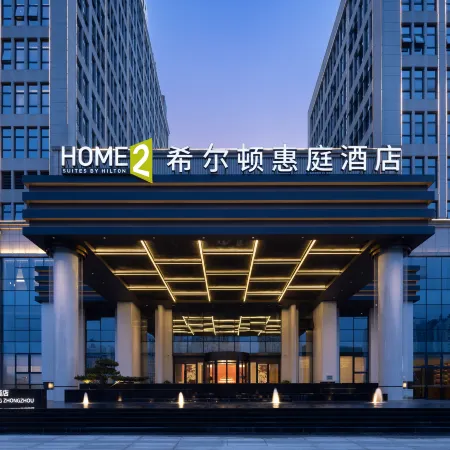 SUITES BY HILTON