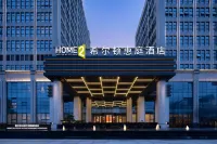 SUITES BY HILTON