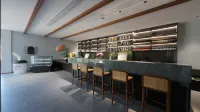 長興頤頌·山澗VillageVilla民宿 - 酒吧