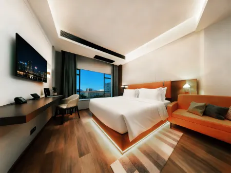 TOWO Shangpin Hotel (Zhuzhou Railway Station Clothing Market Wholesale Branch) Отели рядом с достопримечательностью «Hunan Automobile Engineering Vocational College (New Campus)»