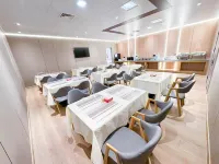 Zhen Ai Apple Hotel (Linyi Tongda Road Taisheng Plaza)