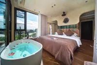 Mangshi Mangli · Pf · Utop Design Guesthouse (Dai Ethnic Ancient Town) - Mountain view