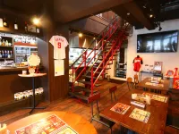 RED HELMET House＆Sports Bar Hiroshima فنادق في هيروشيما