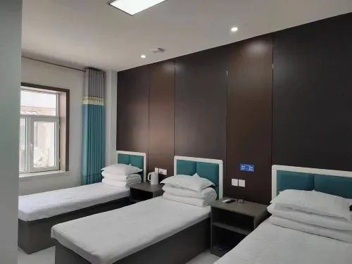 Qiaoqiao Hotel - Parkplatz