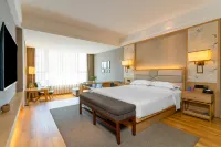 Milan Junyi Hotel Hotels near Orient Shopping Centre Ltd. Tingchuan Branch