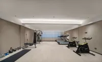 Mo Shang Qing Ju Hotel (Quliang Garment Industrial Park, South University Road, Zhengzhou)