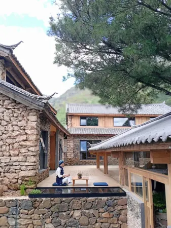 Xuema Yulong Hotel Отели рядом с достопримечательностью «Zimeihu Places of Interest»