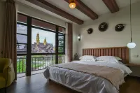 Xinrongju Homestay (Mangshi Daigu Town Branch)