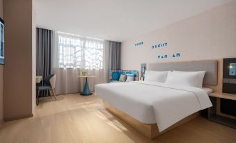 Homeinn · neo (Xishuangbanna Jinghong Poshu Plaza)