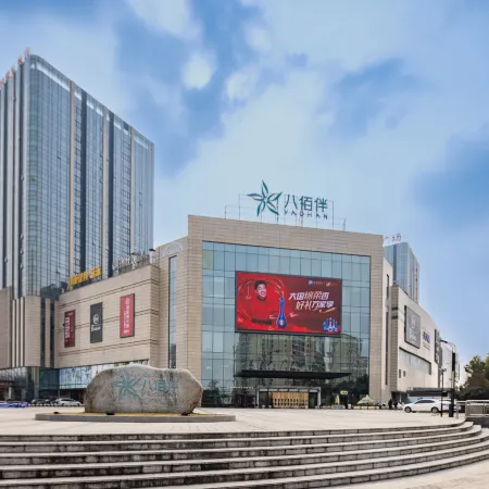 Wutong pomelo hotel (jiaxing nanhu huafu eight hundred companion store） Отели рядом с достопримечательностью «Jiaxing University Biology and Chemistry Engineering College»