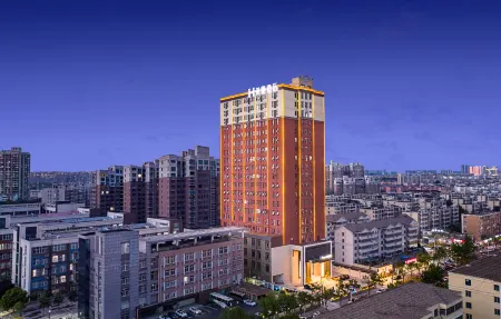 Mehood Theater Hotel (Zhengzhou East Railway Station Provincial Government Branch) Отели рядом с достопримечательностью «Henan Agricultural University (Longzihu Campus)»