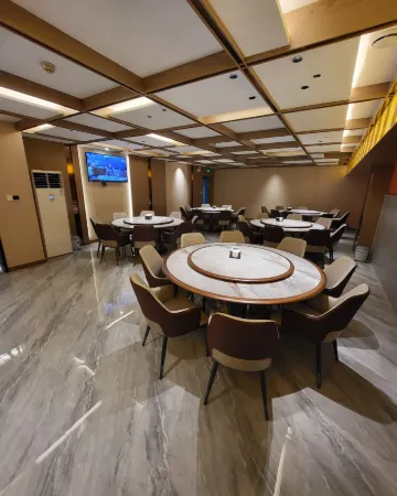 Shanghaorenjia Quality Selection Hotel (Shandong University Impression City) Отели рядом с достопримечательностью «Baihua Park»