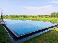Laoling Wending Xingrui Resort Hotel فنادق في له لينغ