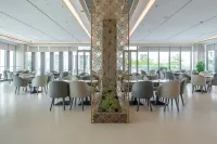 โรงแรมลู่กัง หมิงเยว่ - พร้อมอาหารเช้า